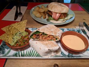 El Gringo burrito and in the background the American burger. at Floripa in Barcelona