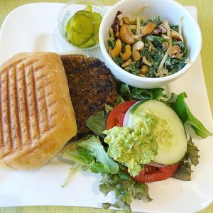 Black bean veggie burger, now served on a vegan bun with vegan cashew slaw  at Sanibel Fresh in Sanibel