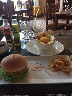 Veggie burger, tropical fruit salad and earl grey tea delicious   at Bar Cafe Restaurante Giroud J&J in Trinidad