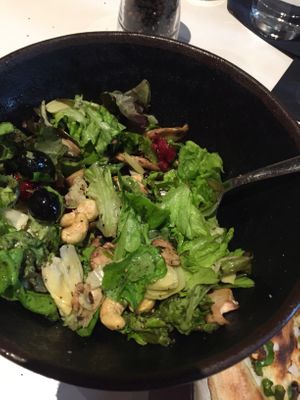 Salad with grapes, mushroom, artichoke, cranberries and cashews at Olverk Pizza & Brewery in Hveragerdi