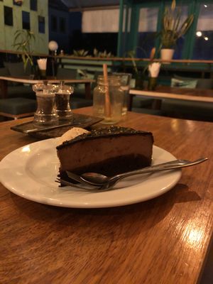 Chocolate cake. Ice cream hidden behind.  at Green-Go Garden in Siem Reap