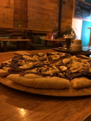 The best way to end a lovely dinner. Pizza topped with vegan Nutella, banana and nuts.  at Green-Go Garden in Siem Reap