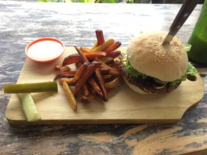 Aussie burger plus sweet potato fries at Small Time Cooks in Abang