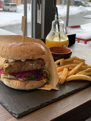 Tempe Burger and orange juice  at Green Farm Cafe  in Kutchan