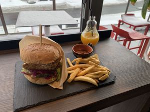 Tempe Burger and orange juice  at Green Farm Cafe  in Kutchan