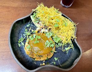 Heart of palms, corn, apple salad with potato sticks and a chickpea burger topped with jam. So good! at Prana Vegetariano - JB in Rio De Janeiro