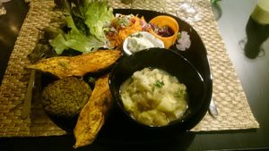 Sweet potato in the oven, onions cream, wafer of broccoli and quinoa and a compote of apples and chicory at Vegetalicia in Namur