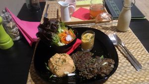 lentils, white bean cream, salad, spicy cream, vinegar at Vegetalicia in Namur