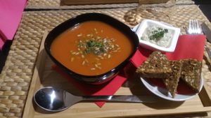 tomato soup with sunflowers, toast, spicy cream at Vegetalicia in Namur