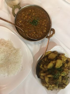 Chickpea curry, potato dish and boiled rice  at Namaste in Crete