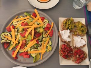 Super fresh and delicious Veggie Salad with Vegan cheese and delicious organic toasted bread tapas just what we needed after a morning at the beach 🏖😋🌱 at Casa Veggy in Nerja