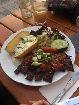 Vegan BBQ spareribs with salad and baked potato with tzatziki at Patchwork Food & Bar in Kulmbach