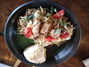 Homemade noodles with tomatoes and bell peppers. Roll at Baker Creek Heirloom Seed in Mansfield