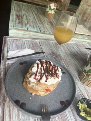 Vegan pancakes with cold green tea and mango to drink   at Bio & Natural - Quinta Avenida in Playa Del Carmen