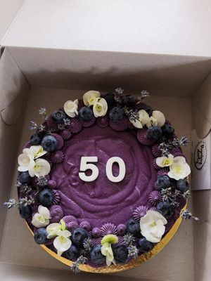 Blueberry cake decorated with blueberries and flowers. at Anniny Dorty in Plzen