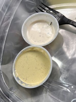 Sauces you can pick to add to your food.  at The Local Wood Fired Grill in Alpharetta