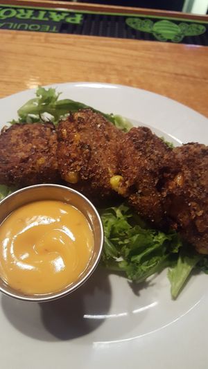 Vegan artichoke, red peppers, corn "crab" cakes with spicy vegan aioli. So good at Brine in Eastham
