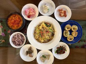 Tofu stew, chinese stirfried noodles, veggie dumplings, side dishes  at Oh Se Gae Hyang - 오세계향 in Seoul