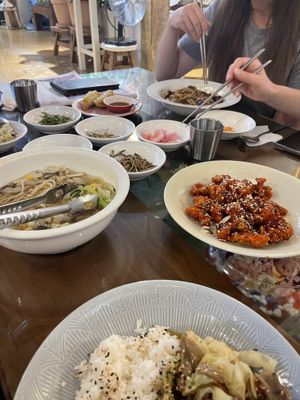 The. Food. Omg. On the bottom the Bulgogi. Then the amazing sweet and spicy „chicken“ on the right above. On the left is the Mushroom Hot Pot. The little plates are side dishes at Oh Se Gae Hyang - 오세계향 in Seoul