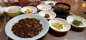 Jjajangmyeon, spicy wheat gluten stew, and side dishes. at Oh Se Gae Hyang - 오세계향 in Seoul