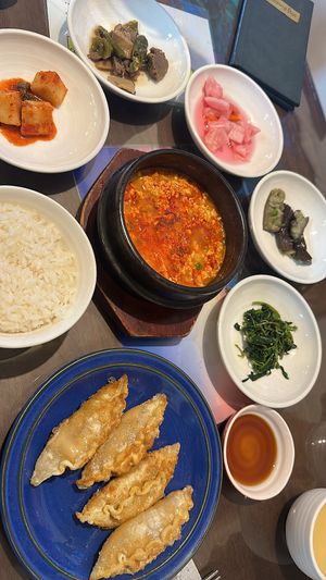 Spicy tofu soup with garlic and onion (fhp). Fried kimchee dumplings  at Oh Se Gae Hyang - 오세계향 in Seoul