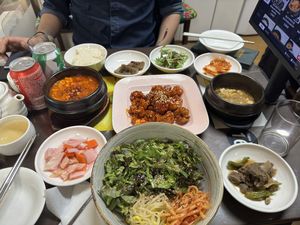 Bibimbap, spicy tofu stew, variety of banchan, and sweet and spicy fried chicken (s size)  at Oh Se Gae Hyang - 오세계향 in Seoul