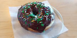 $1.25 Vegan chocolate sprinkled donut for St. Patty's day! at Savage Goods in El Paso