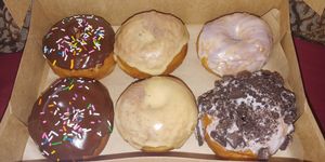 All vegan: Chocolate, Coffee, Lavendar Vanilla and Oreo Cream donuts! at Savage Goods in El Paso