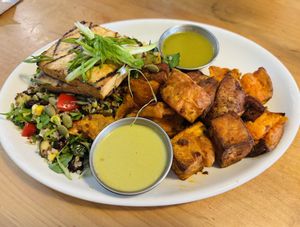Tofu with California quinoa and roasted sweet potatoes  at Mary Be Kitchen in Toronto