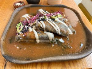 Enchiladas.  It tasted good.  I just wished they were stuffed with something.  Everything you see on top is what’s to be enjoyed with these enchiladas  at Hierba Dulce in Oaxaca