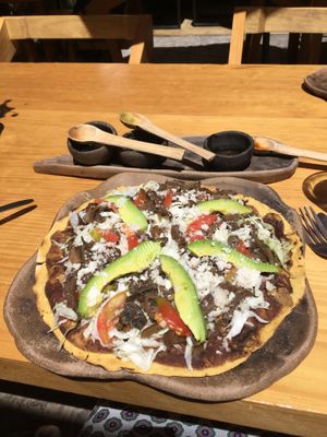 Tlayuda with mushrooms 110 pesos  at Hierba Dulce in Oaxaca