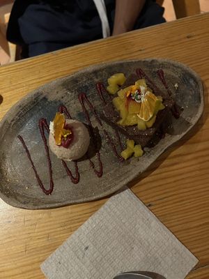Brownie with peanut ice cream and sweet potato sauce   at Hierba Dulce in Oaxaca