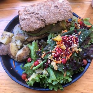Grilled veggie and avocado panini with salad and potatoes at Hierba Dulce in Oaxaca