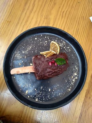 Paleta helada de fresa cubierta de chocolate at Hierba Dulce in Oaxaca