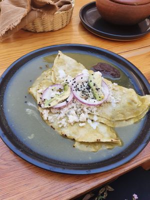 Enchiladas in green sauce  at Hierba Dulce in Oaxaca