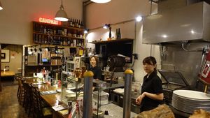Friendly staff and restaurant interior at Bambino in Niigata