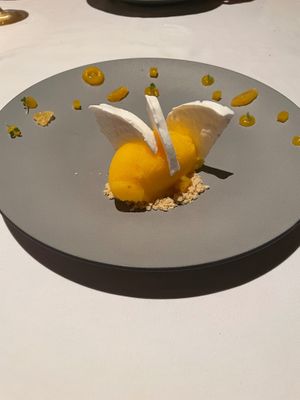 Tangerine Sorbet with corn crumble and ultralight meringue (made with aquafaba) at Cafe Des Artistes in Puerto Vallarta