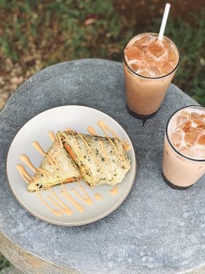 Vegan Breakfast Burrito with iced chais. at Trilogy Coffee in Kilauea