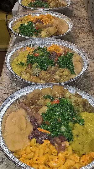 Caribreeze Delicious Vegan Plate Garnished with  a Kale Salad at Caribreeze in Spring Valley