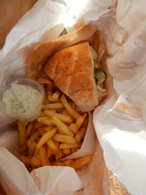 guacamole burger and fries with sauce at De Frietketel in Ghent