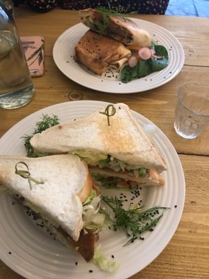 BLT club sandwich and the middle eastern wrap in the background at Seeds for the Soul in Edinburgh