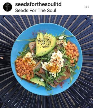 Our bacon and scramble on toast with added beans and Avocado  at Seeds for the Soul in Edinburgh