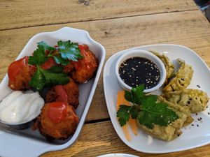 buffalo cauliflower with dips and Asian dumplings with dip at Seeds for the Soul in Edinburgh