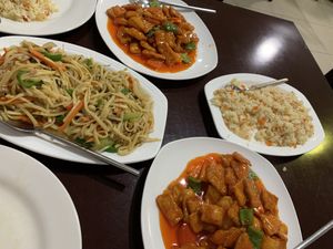 Fried rice, noodles and chicken in (very) sweet and sour sauce. at Pato Beikin in Valencia
