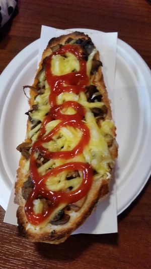 bread with mushrooms and vegan cheese at Warzywniak Trzebnicka in Wroclaw