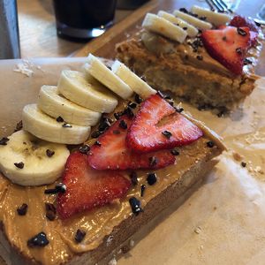 Peanut butter toast with strawberries added at Second Nature in San Diego
