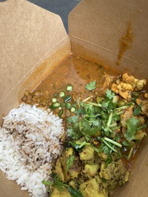 The vegan dishes of the day with rice .  at Gujarati Rasoi - Borough Market Food Stall in South East London