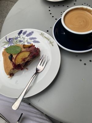 vegan cake & flat white at W Filizance Cafe in Poznan