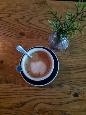 Oatmilk latte at W Filizance Cafe in Poznan