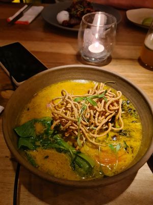 Curry noddle wok dish - v good at Justo Restaurant in Medellin